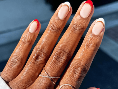 red, white, and gold french nails